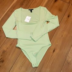 Nwt Sage Green Long Sleeved Bodysuit From Forever 21. Green Long Sleeve Bodysuit For Summer, Casual Long Sleeve Summer Bodysuit, Casual Long Sleeve Bodysuit For Summer, Trendy Stretch Bodysuit For Spring, Spring Green Bodysuit, Fitted Long Sleeve Bodysuit For Summer, Chic Summer Bodysuit By Forever 21, Chic Long Sleeve Bodysuit For Summer, Green Stretch Bodysuit For Spring