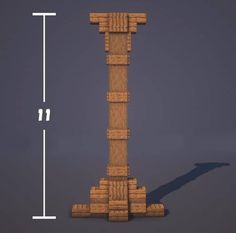 a tall wooden tower sitting on top of a floor next to a measuring line with an arrow pointing towards it