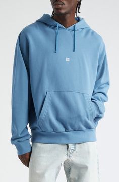 The Parisian label's 4G logo floats at the chest of this boxy-fit hoodie crafted from cozy cotton French terry. 28" length (size Medium) Drawstring hood Kangaroo pocket Ribbed cuffs and hem 100% cotton Dry clean Made in Portugal Designer Clothing Blue Cotton Hoodie With Embroidered Logo, Blue Hooded Sweatshirt With Logo Detail, Casual Blue Hoodie With Logo Detail, Casual Blue Hoodie With Logo, Blue Winter Hoodie With Logo Detail, Blue Winter Hoodie With Logo, Blue Logo Winter Hoodie, Blue Hoodie With Logo Detail, Blue Hoodie With Embroidered Logo