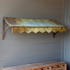 Featuring a lovely bronze and green patina, this aged metal awning adds a playful element to outdoor living spaces. Park Hill Collection | Park Hill Collection Wall Decor 23.25 H x 72.25 W x 23.75 D in brown / gray / green / yellowMetal in Aged Metal Finish | 23.25" H X 72.25" W | Wayfair Carport Addition, Copper Awning, Door Overhang, Farm Estate, Park Hill Collection, Metal Awning, Craftsman Door, Vintage Porch, Aging Metal