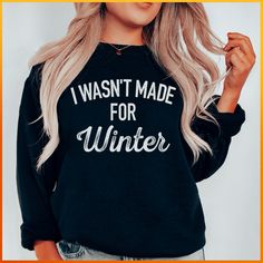 "I Wasn't Made For Winter Sweatshirt" 🍑 Sold by: PeachySunday.com #igmoms #fashion #funnymoms Cute Vinyl Shirts Women Winter, Popular Everything 2024, Cheap Winter Sweatshirt With Lettering, Cute Sweatshirt For Holiday Winter, Fun Winter Crew Neck Sweatshirt, Cute Winter Holiday Sweatshirt, Faith Tees, Winter Sweatshirt, Fall Tee