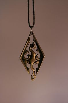 Skyrim Pendant Skyrim Jewelry, Dragon Jewelry, Dragon Pendant, Pretty Jewelry, Geek Out, Mass Effect