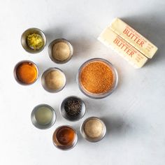 there are many different types of spices in small bowls