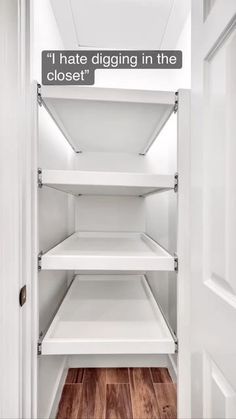 an empty closet with shelves in it and a sign that says, roll out shelves in the linen closet