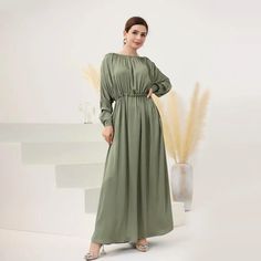 Introducing the 'Atheer' Oversized Modest Dress from Jaela Fashion – where comfort meets style. Get ready to embrace the beauty of an oversized maxi-length dress that's all about elegance and ease. With chic batwing sleeves and an elastic waist, this dress offers both a stunning silhouette and unmatched comfort. Whether you're headed to an event or simply stepping out, the 'Atheer' dress celebrates modesty in the most fashionable way possible. It's time to make a statement and feel effortlessly Flowy Maxi Dress With Batwing Sleeves, Modest Embroidered Maxi Abaya, Modest Long-sleeve Maxi Dress With Smocked Back, Embroidered Long Sleeve Modest Abaya, Spring Modest Maxi-length Thobe, Modest Floor-length Abaya, Every Step You Take, Batwing Sleeve, Modest Dresses