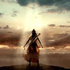 a person standing on top of a rock under a cloudy sky with the words, commonly untoed secrets of ramayan