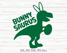 the logo for bunny saurus is shown on a wooden background with an image of a dinosaur