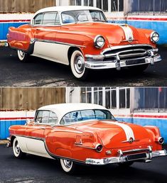 an orange and white classic car parked in front of a building with blue stripes on the side