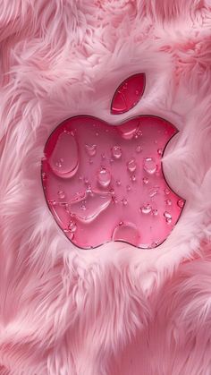 an apple logo on pink fur with drops of water in the center and two red hearts