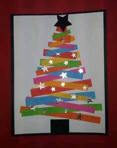 a christmas tree made out of strips of colored paper on a red background with stars