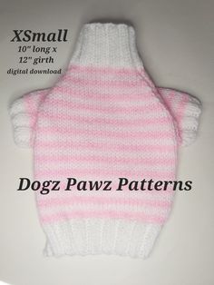 a pink and white knitted sweater with the words dogz pawz patterns on it