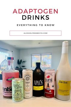 bottles of alcohol sitting on top of a counter in front of a window with the words, adaptogen drinks everything you need to know