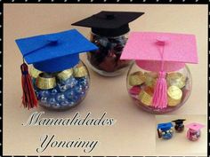 two jars filled with candy and graduation caps