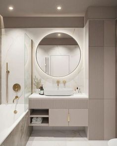 a bathroom with a sink, mirror and bathtub next to a tub in it