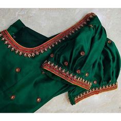 Looking For Fully Customized Blouse? Custom Measurements? Customized Designs? No Problem We Are Here To Help You Out With The Dream Attire You Are Looking For. We Have Well Experienced In-House Designers Who Can Make Your Dream Come True. We Design Fully Customized Handmade Maggam Blouse On The Colour And Design You Choose. You May Request For Any Further Modifications As Per Your Choice. A Minimal, Reasonable Charges Will Be Applied If There Are Any Major Differences.  Please Reach Us For Your Green Silk Blouse For Navratri, Traditional Green Blouse With Yoke Detail, Traditional Green Silk Blouse, Green Tops With Motifs For Festivals, Traditional Green Blouse With Motifs, Traditional Blouse With Yoke For Festivals, Traditional Yoke Blouse For Festivals, Green Short Sleeve Blouse Piece With Pallu, Short Sleeve Green Blouse For Festivals