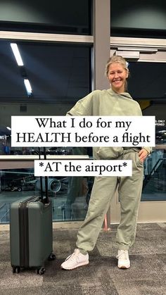 a woman standing in an airport with her luggage and the words what i do for my health before a flight at the airport