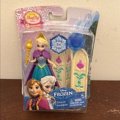 the frozen princess figurines are in their packaging