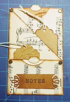 a piece of paper that has some scissors and music notes on it with the words notes