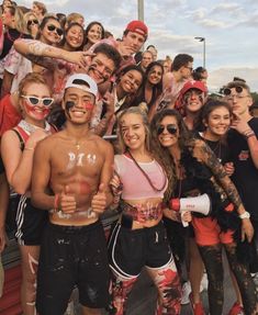 a group of young people standing next to each other