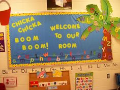 a bulletin board with the words chicka chicka welcome boom to our room