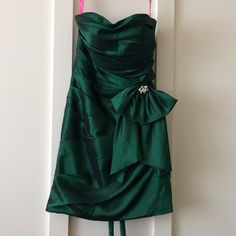 Beautiful Shiny Green Dress Worn Once For A Christmas Formal. Size Six, Fits Tight To Curves Similar To A Bodycon Dress. Lace Up Detailing On The Back And Bow With Crystal Accent In The Front. Nwot. Green Christmas Dress, Christmas Formal, Maggie Sottero, Green Christmas, Dress Lace, Christmas Dress, Halter Formal Dress, Wearing Dress, Green Dress