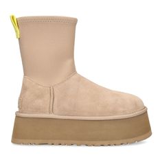 The Classic Dipper Is Legitimately An Autumnal Slay. The Shaft Is A Calf-Hugging Neoprene With A Medial Side-Zipper, The Platform Is A Leg-Lengthening 2 Inches Of Maximalist Joy, And The Inside Is Lined With The Feel Of Ugg From Our Uggplush Lining. The Classic Dipper Is Ready To Support Your Most Authentic Self-Expression. Suede, Neoprene Upper Suede Heel Counter Medial Zipper, Functional Shaft Zippers 17mm Uggplush 60% Upcycled Wool, 40% Tencel Lyocell Lining 17mm Uggplush 60% Upcycled Wool, 4 Ugg Shoes Women, Ugg Classic, Trainer Boots, Rubber Boots, Shoes Heels Pumps, Boots Knee, Fashion Socks, Platform Boots, Womens Uggs