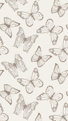 a bunch of butterflies flying in the air with their wings spread out and facing different directions