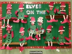 a bulletin board with elves on the shelf