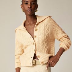 Collared cable-knit cardigan sweater Elegant Cable Knit Sweater For Spring, Classic Long Sleeve Cable Knit Outerwear, Winter Workwear Sweater, Fitted Long Sleeve Cable Knit Sweater Coat, Long Sleeve Cable Knit Sweater Coat For Work, Classic Cable Knit Cardigan For Fall, Cable Knit Long Sleeve Sweater Coat For Work, Trendy Cable Knit Cardigan For Workwear, Spring Cable Knit Outerwear For Work