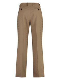 Looking to add a touch of flair to your wardrobe? These designer trousers are crafted with a stylish jacquard motif, making them a standout choice for any occasion. Perfect for those days when you want to feel effortlessly chic. Two side pockets for convenience Two buttoned back welt pockets Made from 100% polyester Color: Camel (Color Code: 2708) Season: SS24 Designed for: MEN Made in Italy Luxury Khaki Trousers, Gucci Luxury Formal Pants, Gucci Cotton Pants For Workwear, Luxury Gucci Beige Bottoms, Gucci Formal Trousers, Formal Gucci Pants, Chic Gucci Trousers, Buy Gucci, Jacquard Pattern