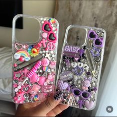 two cell phones that are covered in glitter and some other things on the phone case