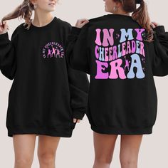 Key Features:In My Cheerleader Era Sweatshirt, In My Cheer Era Hoodie, Cheerleader Sweatshirt, Cheerleader Gifts, Cheerleader Shirt, Cheerleader Hoodie | HOW TO ORDER? || It's easy to place an order! Please check the theme, color, and size of all images in this listing. - From the drop-down menus, choose the size and color. - For personalization, fill in the blank box with your design color. Please look at the photos in this listing to see what colors are available. (Example: Design Color White) Black Long Sleeve Cheerleading Sweatshirt, Long Sleeve Winter Cheerleading Sweatshirt, Varsity Long Sleeve Sweatshirt For Cheerleading, Long Sleeve Team Spirit Cheerleading Sweatshirt, Sporty Long Sleeve Sweatshirt For Cheerleading, Cheerleading Long Sleeve Graphic Print Sweatshirt, Casual Hoodie With Letter Print For Cheerleading, Cheerleader Gifts, Cheerleading Shirts