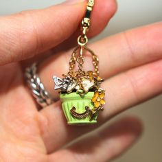 Juicy Couture Gold Hanging Planter Green Pot Flowers Keychain Bracelet Charm 🔥 | eBay Spring Season Jewelry Gift With Chain Detail, Spring Season Gift Jewelry Chain, Spring Jewelry Chain As A Gift, Trendy Green Jewelry With Flower Charm, Cute Metal Chain Jewelry, Flowers Keychain, Pot Flowers, Keychain Bracelet, Juicy Couture Charms