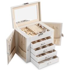 an open white jewelry box with five drawers and three necklaces in each drawer, on a white background