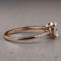 an engagement ring with a princess cut diamond