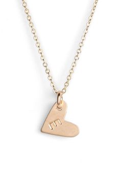 From humble beginnings to a fully staffed warehouse in Oregon, Nashelle remains true to its original purpose-handmade jewelry crafted with love and intention. The heart initial necklace is no different-with a hand-stamped pendant anchored by a single ring, it makes for a perfect layering piece. Style Name:Nashelle 14K-Gold Fill Initial Mini Heart Pendant Necklace. Style Number: 5143637. Available in stores. Dainty Engraved Heart Necklace For Everyday, Minimalist Hand Stamped Heart Pendant Jewelry, Simple 14k Gold Jewelry With Heart Charm, Everyday Gold Initial Necklace With Heart Charm, Gold Initial Necklace With Heart Charm For Everyday, Minimalist Heart Charm Jewelry For Mom, Everyday Hand Stamped Heart Pendant Jewelry, Simple Heart Pendant Jewelry For Anniversary, Rose Gold Heart Jewelry With Initials