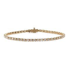 Turn heads with this stunning lab-grown diamond tennis bracelet. Set in warm 14-karat yellow gold  all the diamonds in this classic bracelet design are hand-matched for consistent color  clarity  and sparkle. A secure box clasp offers worry-free daily wear. Classic Gold Bracelet With Round Cut Cubic Zirconia, Classic Gold Bracelet With Cubic Zirconia Round Cut, Classic Yellow Gold Diamond Bracelet With Prong Setting, Classic Yellow Gold Tennis Bracelet With Diamond Accents, Classic Yellow Gold Tennis Bracelet For Formal Events, Classic Gold Diamond Bracelet With Round Cut, Classic Gold Bracelet With Diamond White Prong Setting, Classic Yellow Gold Tennis Bracelet With Single Cut Diamonds, Classic Gold Bracelet With Prong Setting