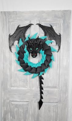 a door with a dragon decoration on it