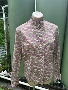 In immaculate condition, has been very lightly worn .  Stunning quality and style from this Iconic brand which rarely makes blouses .  Tagged 16 size but fits like a Medium (12) Australian.  Laid flat measures 57cm armpit to armpit,  Total length is 60.5cm .  Sleeve length is 61cm from shoulder seam . High Neck Blouse, High Neck, Womens Clothing Tops, Blouses For Women, Sleeve Length, Bathing Beauties, Tops & Tees, Couture, Purses And Bags