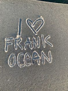 i love frang ocean written in chalk on the sidewalk with white writing and hearts