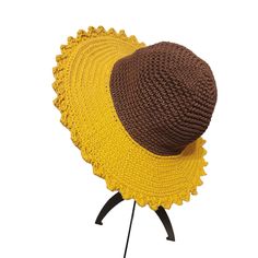 "Crochet Sunflower Hat made with 100% cotton yarn and a metal ring to help it hold its shape. Average size, one size fits most. (My head is 22\" around and it fits me semi-snugly). Available in Light Yellow or Gold (pictured). Made to order. Please allow up to 6 weeks for shipment." Yellow Crochet Beach Hat, Adjustable Crochet Hat With Curved Brim In Cotton Yarn, Adjustable Yellow Crochet Cap, Yellow Adjustable Crochet Cap, Adjustable Cotton Yarn Crochet Hat With Curved Brim, Adjustable Crochet Wide Brim Hat, Yellow Yarn Beach Hat, Yellow Knitted Beach Hat, Yellow Hand Knitted Beach Hat