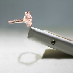 14K rose gold setting 1.52 ct. marquise shape peach-pink morganite ring   Diamond pave 1.8 mm width band VS clarity diamonds Peach Morganite Ring, Pink Morganite Ring, Peach Morganite, Unique Engagement Ring, Morganite Ring, Unique Ring, Jewelry Unique, Unique Engagement, Ring Unique