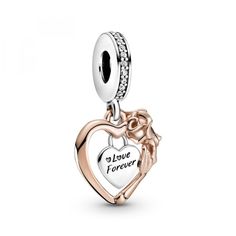 PRICES MAY VARY. Rose Flower Charm: Deliver a message of love with this delicate heart charm; the frame features intricate rose petal and leaf details, while the padlock includes the engraving “Love forever” Compatible with Pandora Moments: Pandora Moments is a way to say something about who you are through every charm and bracelet you choose and how you choose to wear it Sterling Silver Jewelry: Silver is known for its soft, white surface and is Pandora's signature metal, with the majority of o Pandora Jewlery, Oakley Sunglasses Women, Romeo Und Julia, Diy Jewelry Gifts, Pandora Heart, Heart Shaped Frame, Pandora Beads, Heart Rose, Bracelet Pandora