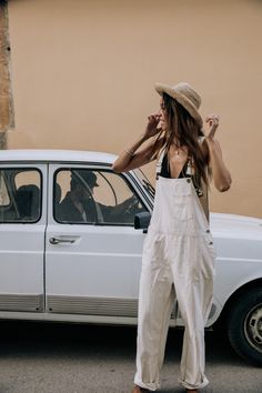 Retro oversized overalls. Baggy vintage inspired cream overalls. 1990's street style women. Grunge fashion ideas for winter and summer! Includes a front pocket and vintage brass buttons. Summer beach aesthetic. Vintage aesthetic. Perfect pair of overalls.