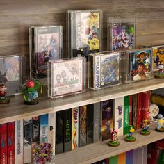 the shelves are filled with video games and figurines