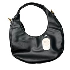 New With Defects Melie Bianco Vegan Leather Black Danni Large Convertible Hobo Bag This Melie Bianco Hobo Bag Offers A Stylish And Eco-Conscious Design, Crafted From High-Quality Vegan Leather. Ideal For Everyday Use. Sometimes Sold At Athropologie Included Cross Body Strap Condition Notes: This Bag Is New But Has Exterior Staining From Some Type Of Spill. Bag Has Been Cleaned But Staining Remained. Handheld Hobo Bag With Detachable Strap For Errands, Chic Black Baguette Bag For On-the-go, Chic Black Baguette Bag With Leather Handles, Melie Bianco, Tan Purse, Hobo Purse, Fringe Bags, Vegan Leather Bag, Trending Handbag