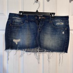 Brand New Condition W/Out Tags, Distressed Look And Super Mini, Back And Front Pockets, Will Ship Fast Distressed Blue Mini Skirt, Ripped Blue Mini Skirt, Casual Blue Distressed Mini Skirt, Blue Ripped Mini Skirt, Distressed Mid-rise Blue Skirt, Mid-rise Distressed Blue Skirt, Button Down Denim Skirt, Denim Pleated Skirt, Button Down Mini Skirt