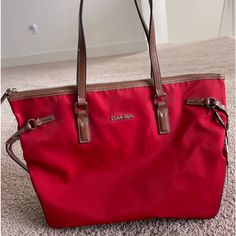 Nwot Calvin Klein Handbag Tote Excellent New Condition Never Used Just Sitting In The Closet Red Red Lots Of Compartments, Easy To Clean Nylon. Tiny Dirt On Side. Perfect For Everyday Go To Last One. Size Approximately 16x11x5 Red Shoulder Bag With Zipper For Travel, Calvin Klein Casual Shoulder Bag For Shopping, Casual Calvin Klein Shoulder Bag For Shopping, Calvin Klein Travel Tote Bag, Red Shoulder Bag With Zipper For Shopping, Red Shoulder Bag With Zipper Closure For Shopping, Calvin Klein Tote Shoulder Bag With Zipper, Calvin Klein Tote Shoulder Bag With Zipper Closure, Red Bags With Zipper Closure For Errands