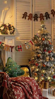 a decorated christmas tree sitting in front of a window