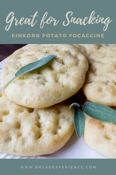 three cookies on a plate with sage leaves and the words great for snacking linkon potato focaccine